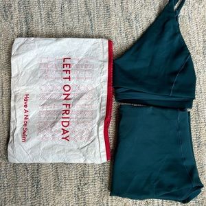 Left on Friday set. Sunday top and Hi Tide bottoms. Color: Deep End.